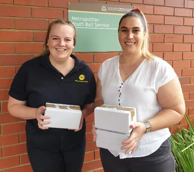 Ashleigh Small BA '17, MSW '19 delivering phones to the Metropolitan Youth Bail Service